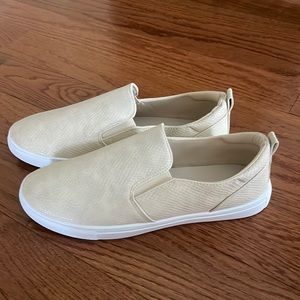 Beige boat shoes. New without tags —- never worn!